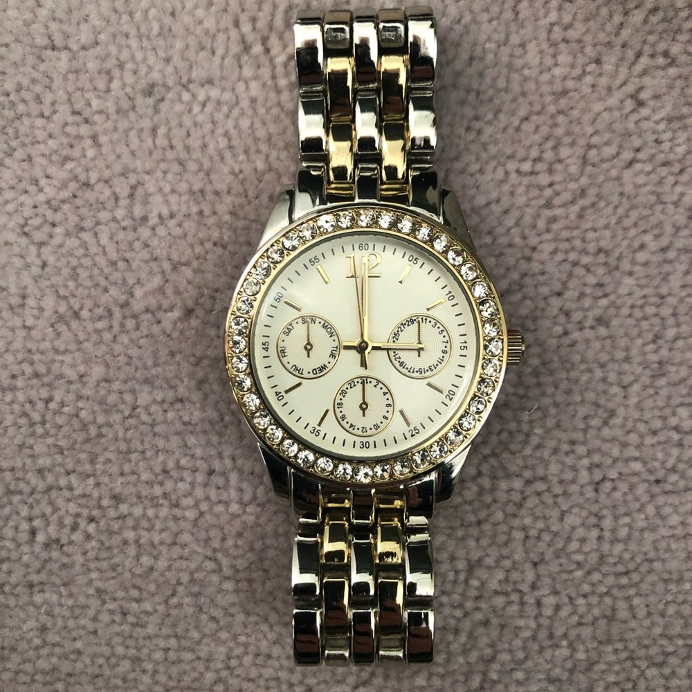 Gold and silver tone crystal face watch